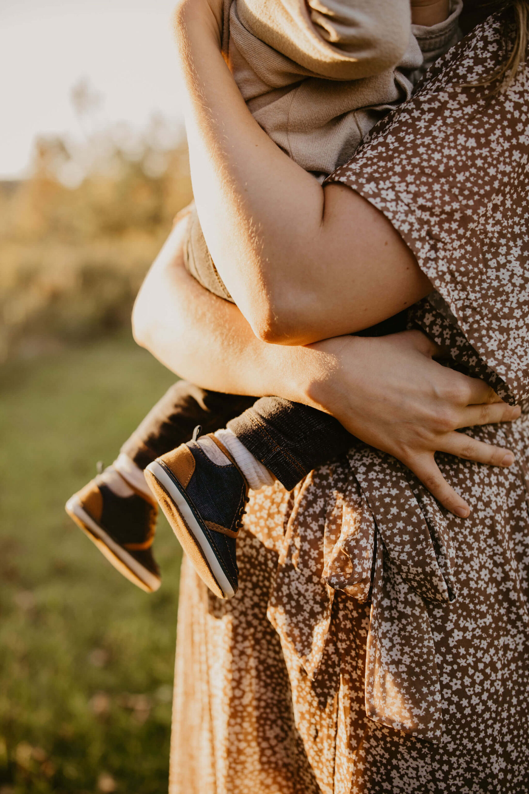 close up image of a mother holding her son