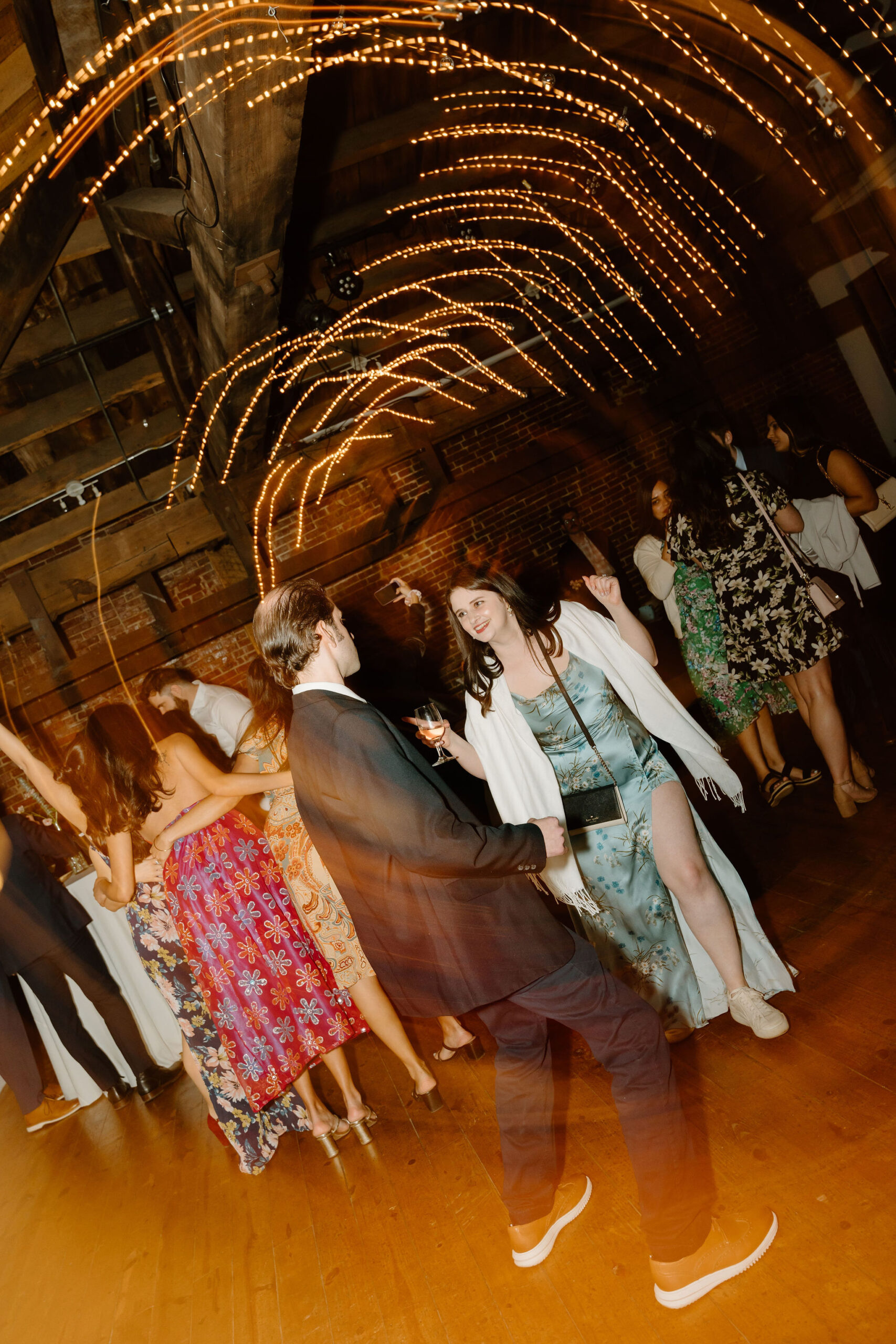 a couple dancing together during the wedding reception