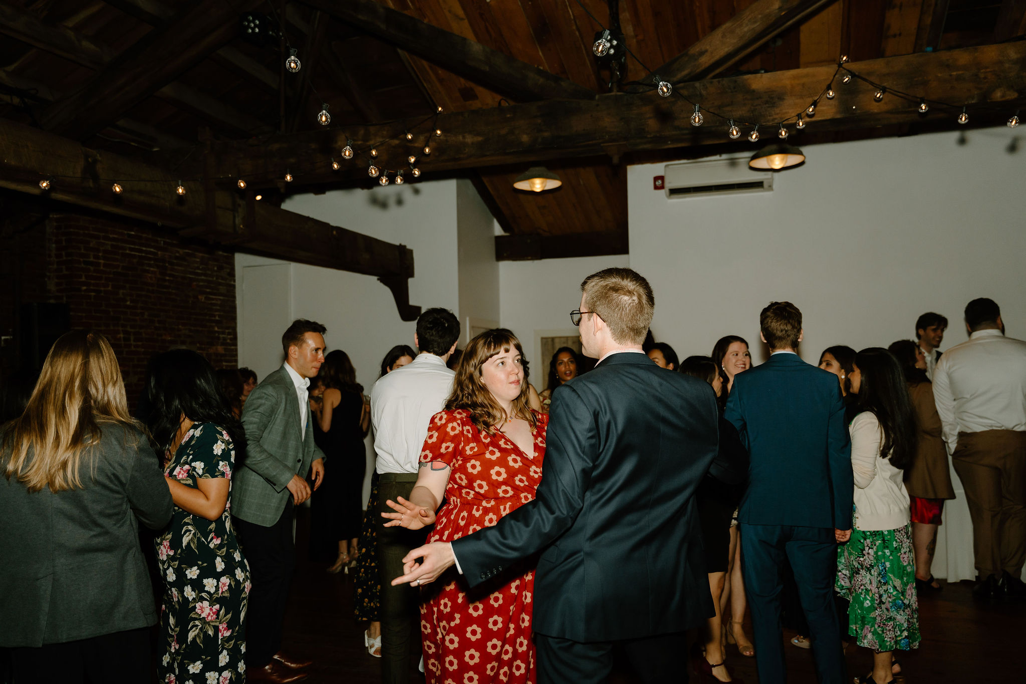 a couple dancing together during the wedding reception