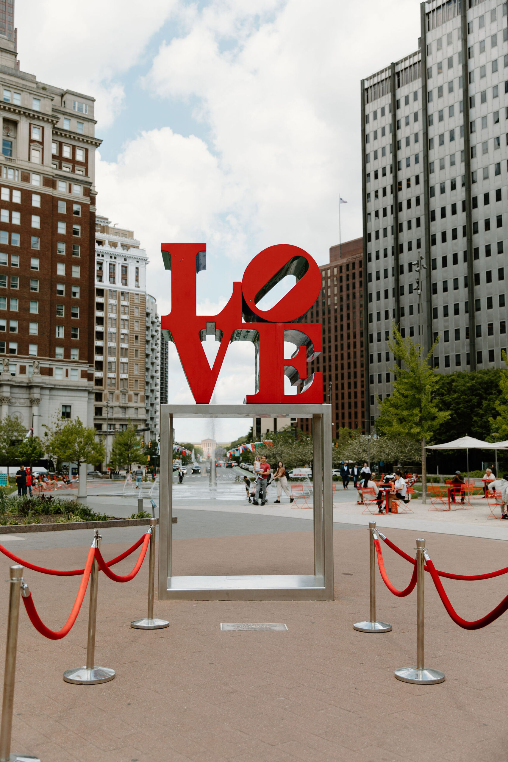 The large red LOVE sign at Love Park, with red velvet roped off aisle