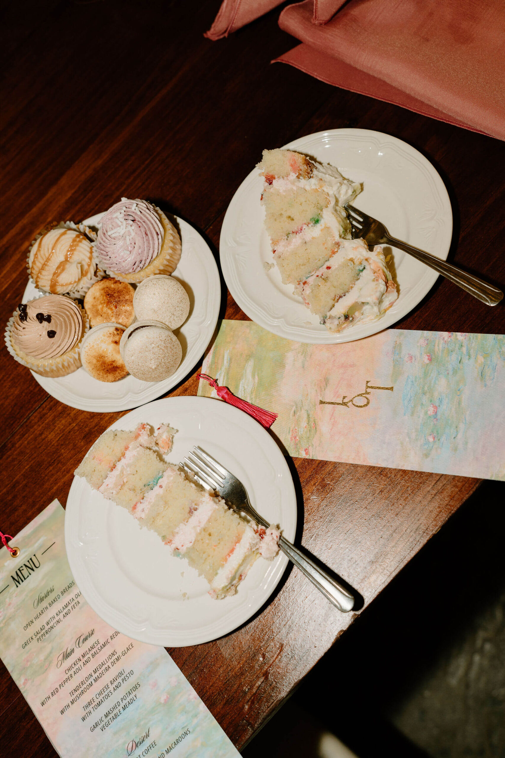 desserts and invitation suite with funfetti wedding cake