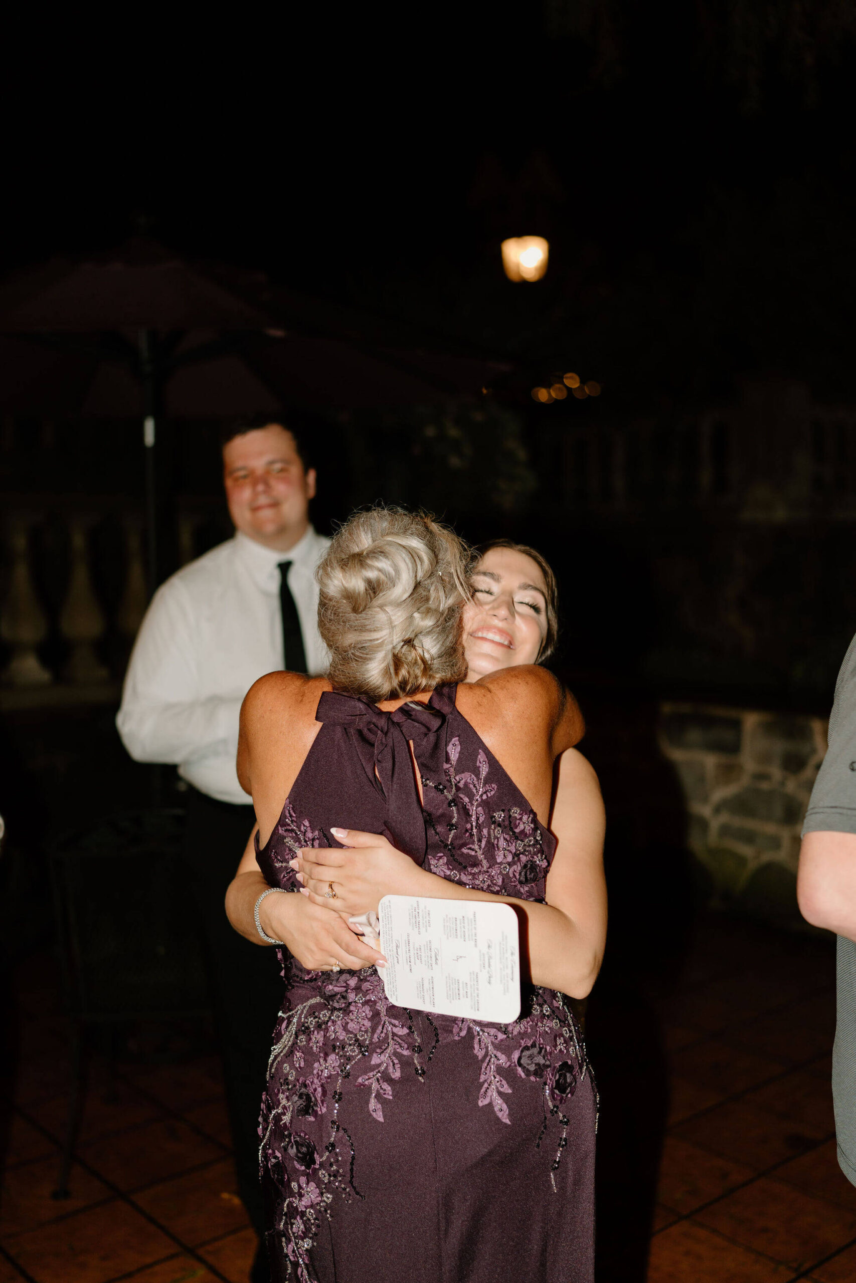 bride hugging mother of the groom
