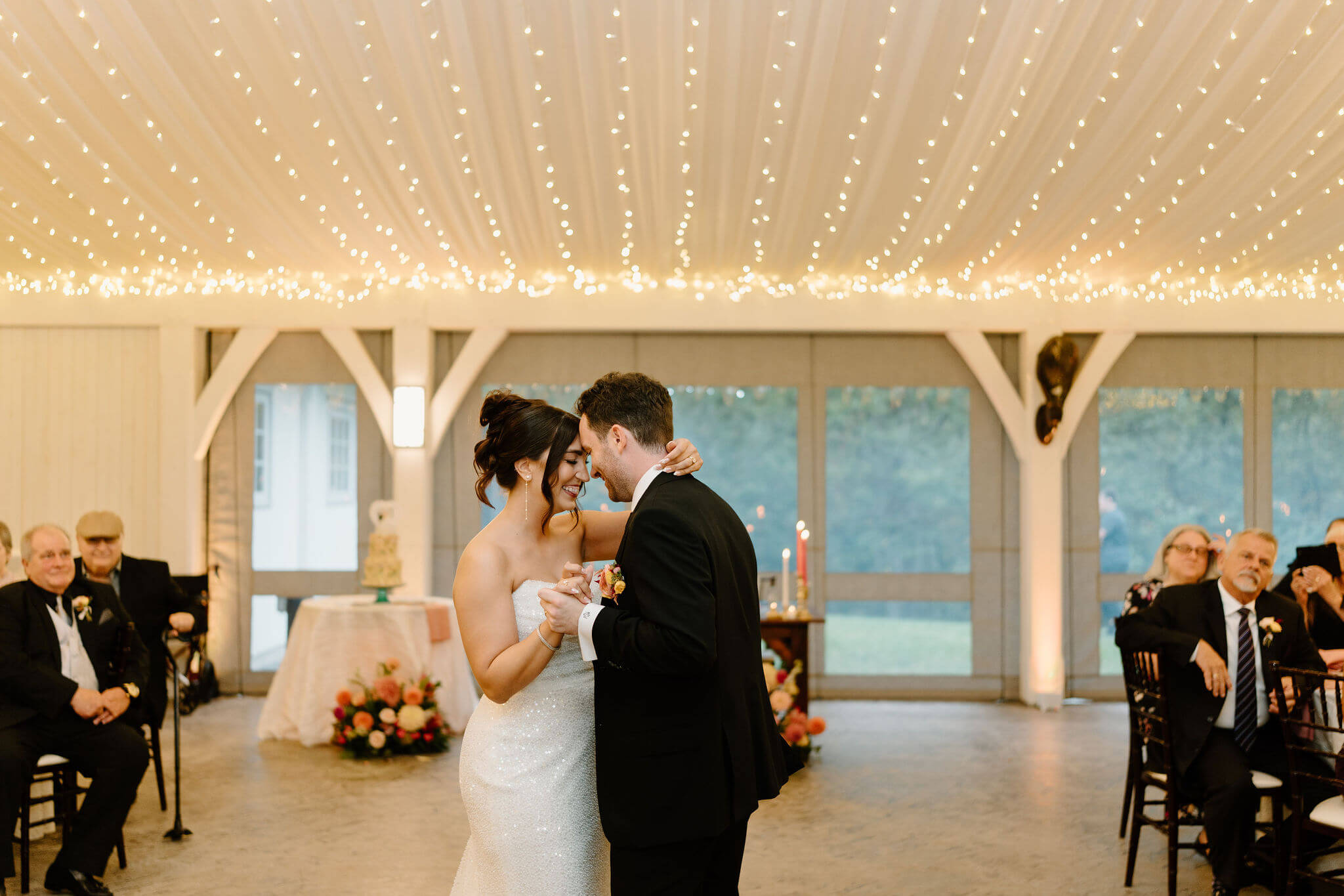 bride and groom during first dance in their wedding reception
