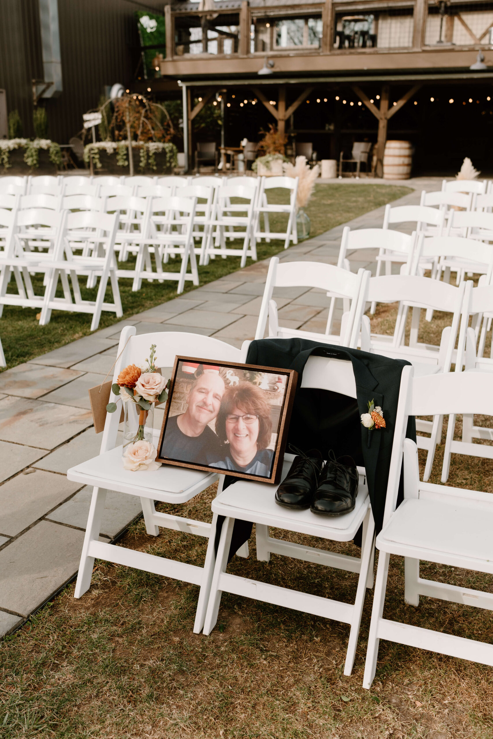 memorial for groom's late parents set up prior to his wedding ceremony