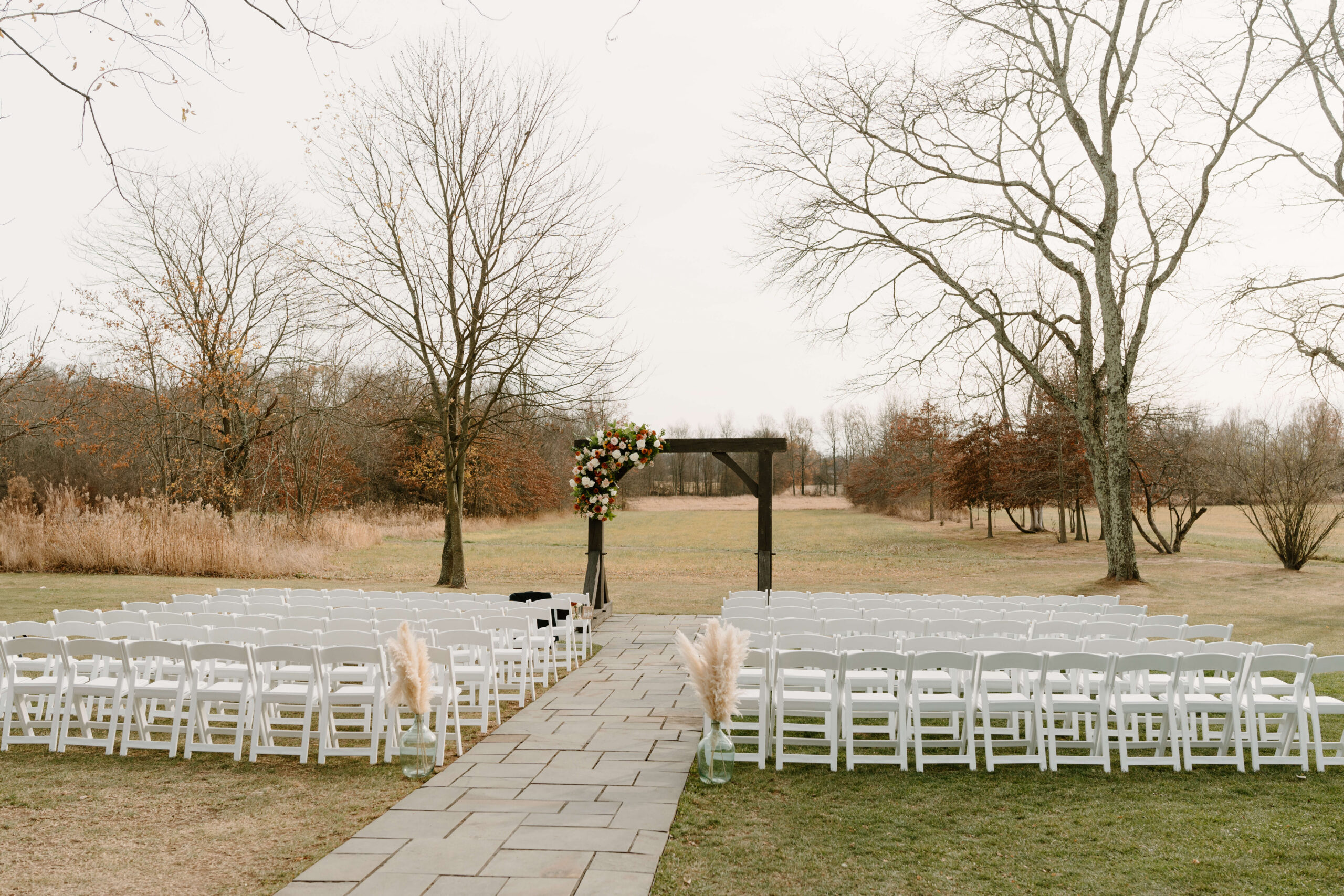 outdoor ceremony site in a field for a November wedding at the Farm Bakery and Events in Quakertown, PA