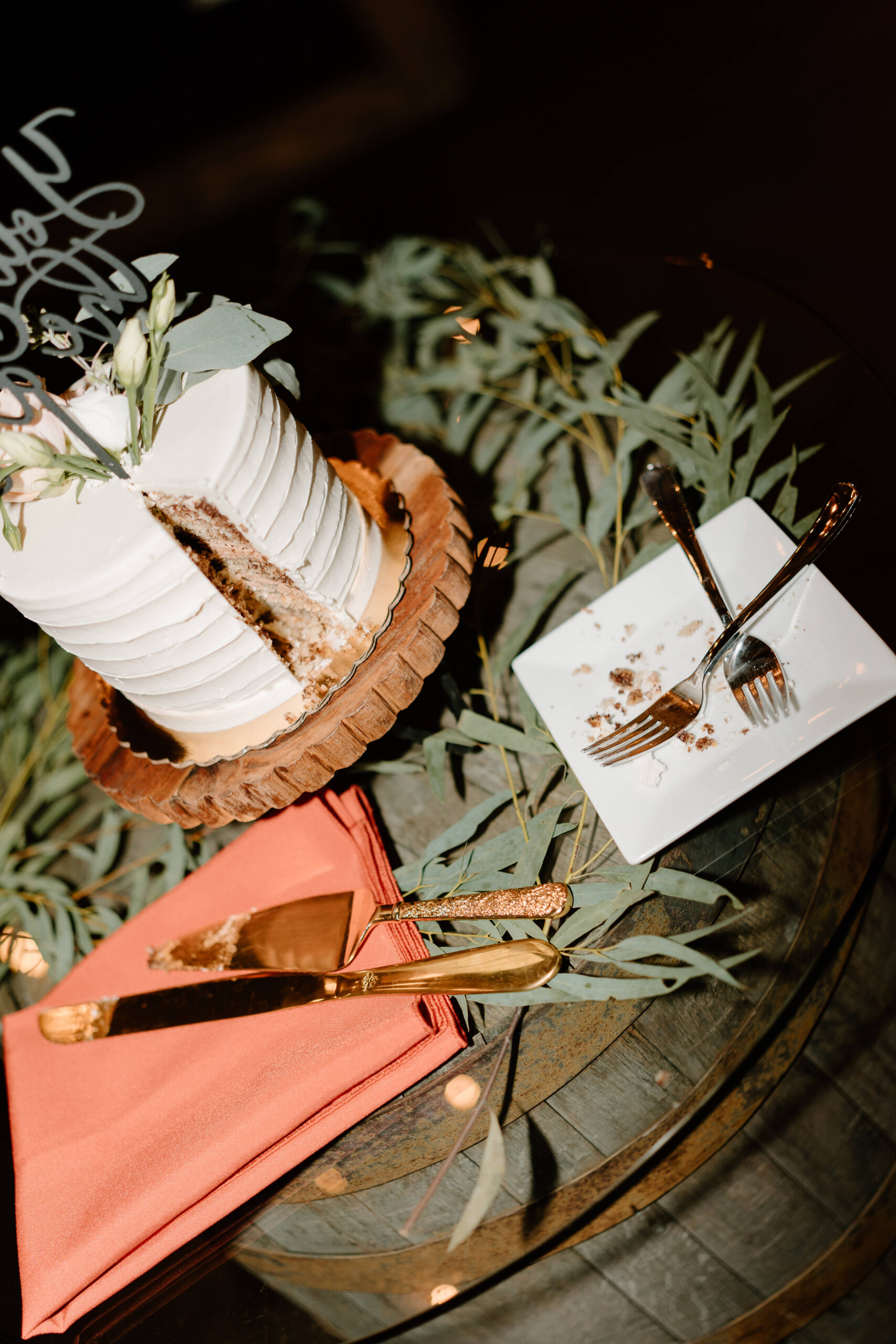 close up of the slice taken out of wedding cake during wedding reception